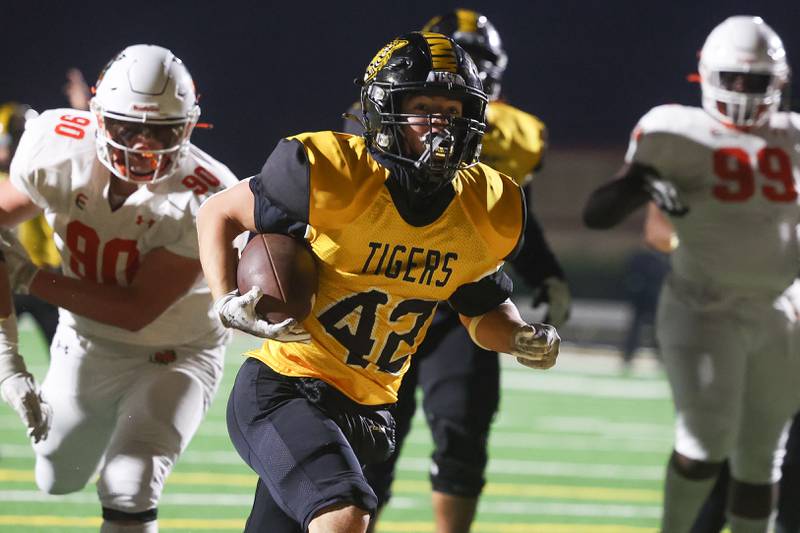 Joliet West’s Gavin Garcia goes in for the score against Plainfield East on Friday, Oct. 13, 2023 in Joliet.