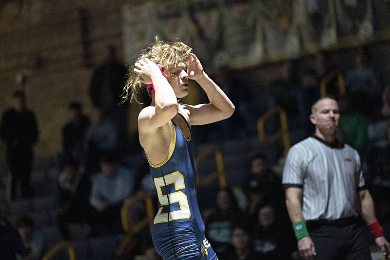 Sterling’s Christopher Wellman celebrates pin over Rock Falls’ Ryan McCord at 152 pounds Wednesday, Dec. 21, 2022.
