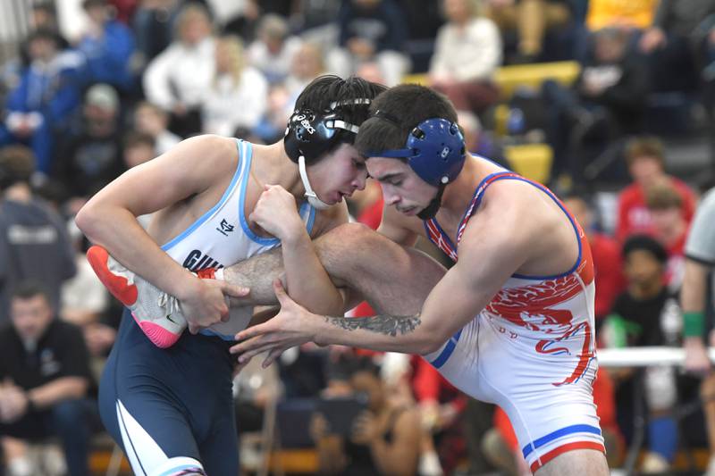 Oregon's Josiah Perez (right) battles Guilford's Dominc Angileri in the 120-pound championship match at the Polo Wrestling Invitational on Saturday, Jan, 10, 2026 at Polo High School.