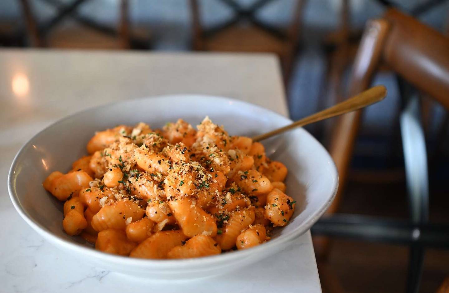 Housemade ricotta gnocchi is a menu staple at Mockingbird Bar + Garden and is served in a seasonal sauce, this time an Aurora sauce, which is béchamel with roasted tomato.