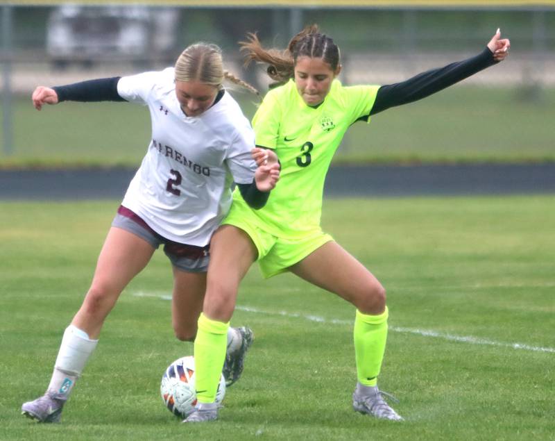 Marengo’s Myah Broughton, left, battles Richmond-Burton’s McKenzie Ragusca in IHSA Class 1A Regional Title Game action soccer at Marengo High School in Marengo on Wednesday, May 21, 2025.