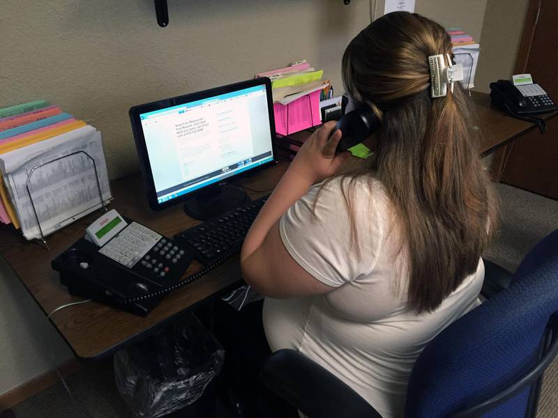 A Crisis Line of Will and Grundy Counties volunteer operator fielded calls during her four-hour shift in 2015. The number of calls can range from 10-35 calls per hour.