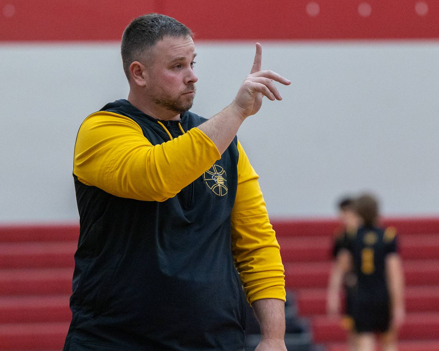 Putnam County Head Coach, Jared Sale calls play during the Colmone Classic on Monday, December 8, 2025 at Hall High School in Spring Valley.