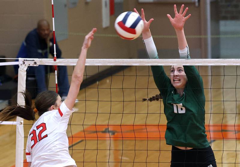 Fremd’s Sasha Sallade tries to block Huntley's Izzy Whitehouse Monday, Nov. 11, 2024, during their Class 4A supersectional match at DeKalb High School.
