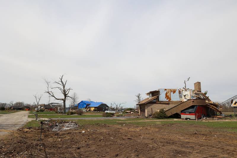 Homes along Shaftsbury Road in Aroma Township are shown on April 8, 2026, nearly one month after the EF-3 tornado.