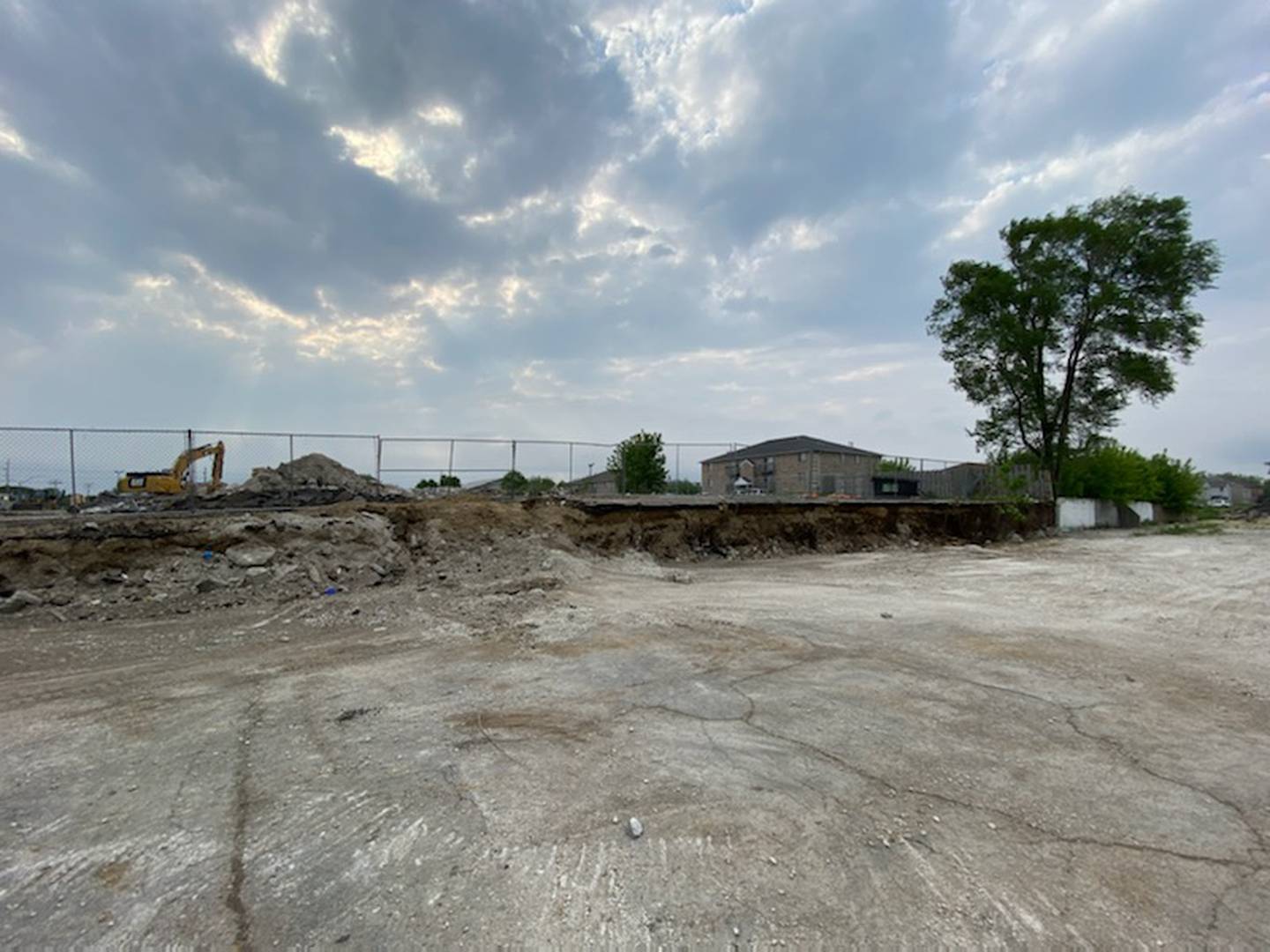 Both parties (the city of DeKalb and Hunter Hillcrest LLC) claim ownership of a 5.8-foot strip of land which was until days ago a retaining wall between the Hunter Hillcrest property and the empty lot where once sat movie theater Campus Cinemas, which the city of DeKalb also owns. Hunter Hillcrest filed a temporary restraining order against the city of DeKalb to halt the demolition on what they said is their property. The request was denied by a DeKalb County judge Friday, May 20, 2022.