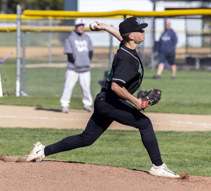 North Boone’s Gage Vermett fires a pitch against Dixon Tuesday, May 6, 2025.