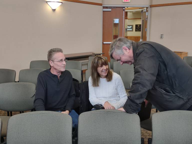 Bob and Dianne Miller speak briefly with Don Kountz during a hearing of the Crystal Lake Municipal Officers Electoral Board on Wednesday, Jan. 25, 2023. Kountz had challenged the candidacy of council member Brett Hopkins, who was running for re-election; the electoral board overruled Kountz's objections.