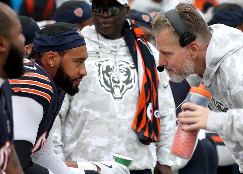 Chicago Bears Head Coach Matt Eberflus talks to Chicago defensive end Montez Sweat during their game against the New England Patriots Sunday, Nov. 10, 2024, at Soldier Field in Chicago.