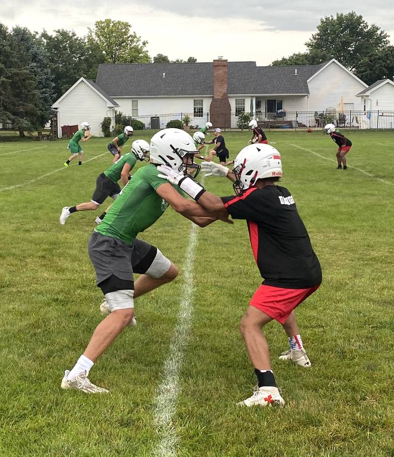Dwight receiver Joey Starks (left) and Streator cornerback LA Moton battle at the line of scrimmage Tuesday, July 9, 2024, during a 7-on-7 at Dwight High School.