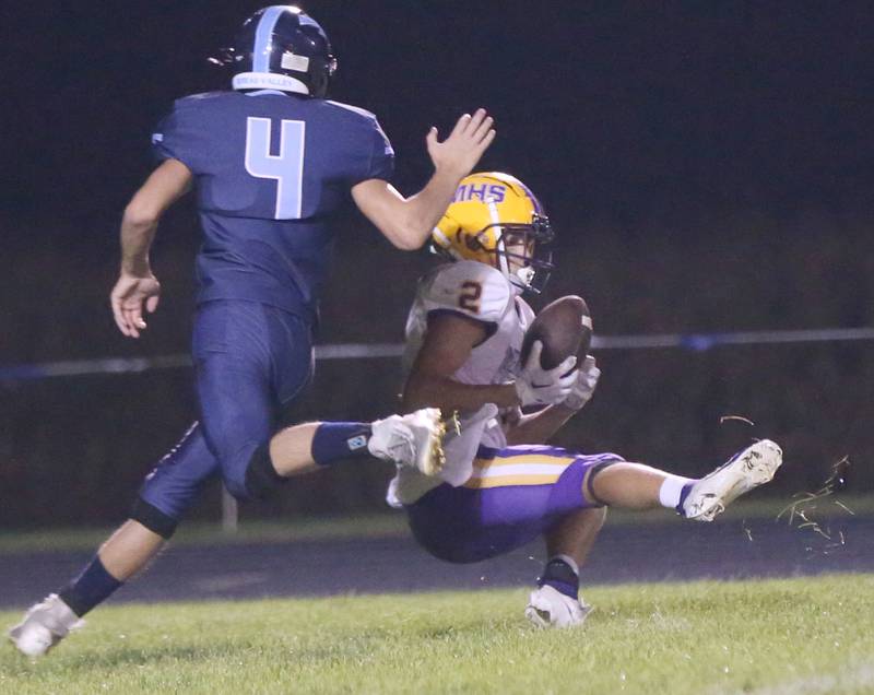 Mendota's Keegan Beetz makes.a catch down the field over Bureau Valley's Brooi Shane on Friday, Sept. 22, 2023 at Bureau Valley High School.