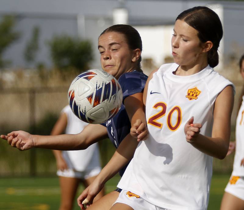Willows Academy's Sofia Castillo battles with Richmond-Burton's Ella Seyller for the ball during an IHSA Class 1A Cristo Rey St. Martin Sectional semifinal girls soccer match on Tuesday, May 26, 2026 at Cristo Rey St. Martin College Prep, in Waukegan.