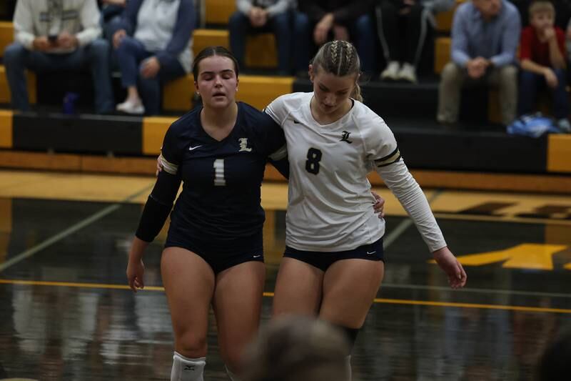 Lemont’s Nora Miller, left, and Sophia Swiderski leave the court after falling to St. Laurence in the Class 3A St. Laurence Sectional championship on Thursday, Nov. 7, 2024 in Burbank.
