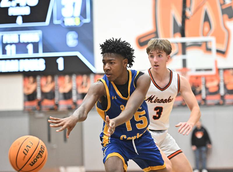 Joliet Central's James Lee (15) passes the ball during a conference game against Minooka on Friday, Jan. 10, 2025, at Minooka.
