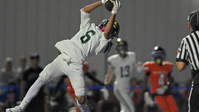 Fremd rides ground game past Hoffman Estates in battle of unbeatens