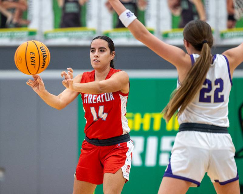 Isabel Gutierrez (14) of Streator passes ball to teammate on Monday, November 17, 2025 at Seneca High School in Seneca.