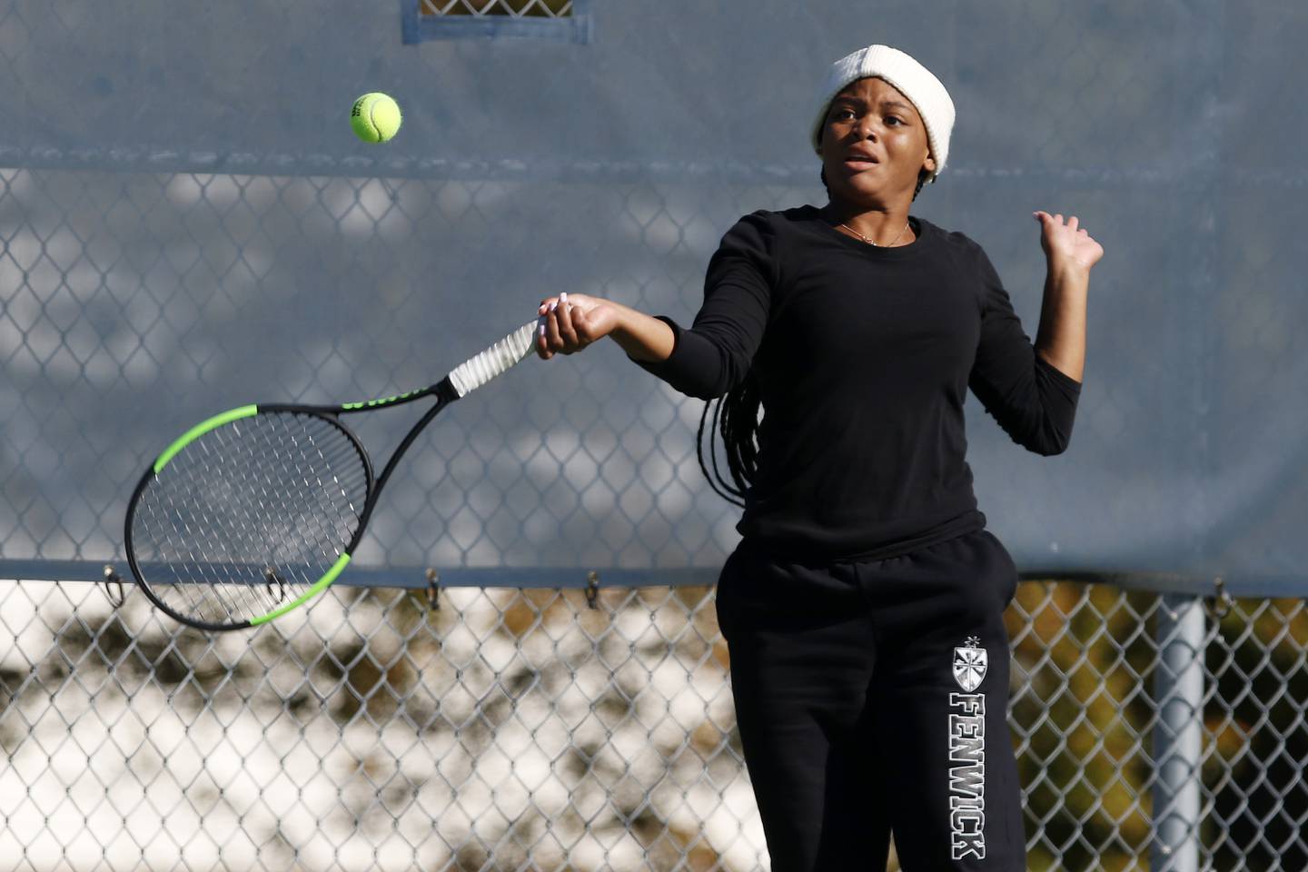 Fenwick's Trinity Akrdin hits the ball in her match with teammate Megan Trifilio against Teutopolis during the girls state tennis 1A doubles tournament at Buffalo Grove High School on Saturday, Oct. 23, 2021 in Buffalo Grove.