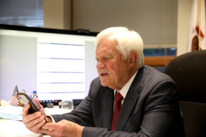 Kane County Clerk Jack Cunningham, who is running for re-election against challenger Douglas Warlick, troubleshoots an IT issue regarding the election results from his Geneva office after the polls closed for the General Primary Election on Tuesday, June 28, 2022.