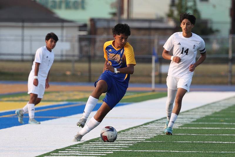 Joliet Central’s Alexis Guzman works the ball against Joliet Catholic on Monday, Sept. 9, 2024 in Joliet.