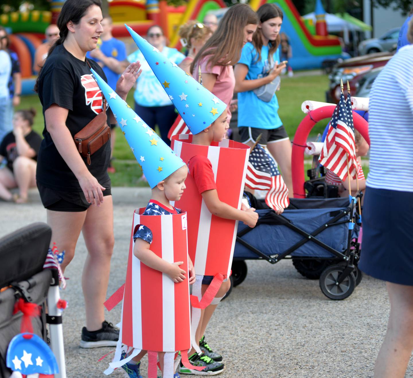 Harlan and Ellis Fry, 7 and 4, of Mt. Morris, were dressed as firecrackers for the Kiddie Parade at the Let Freedom Ring festival in Mt. Morris on Friday, July 5, 2024.