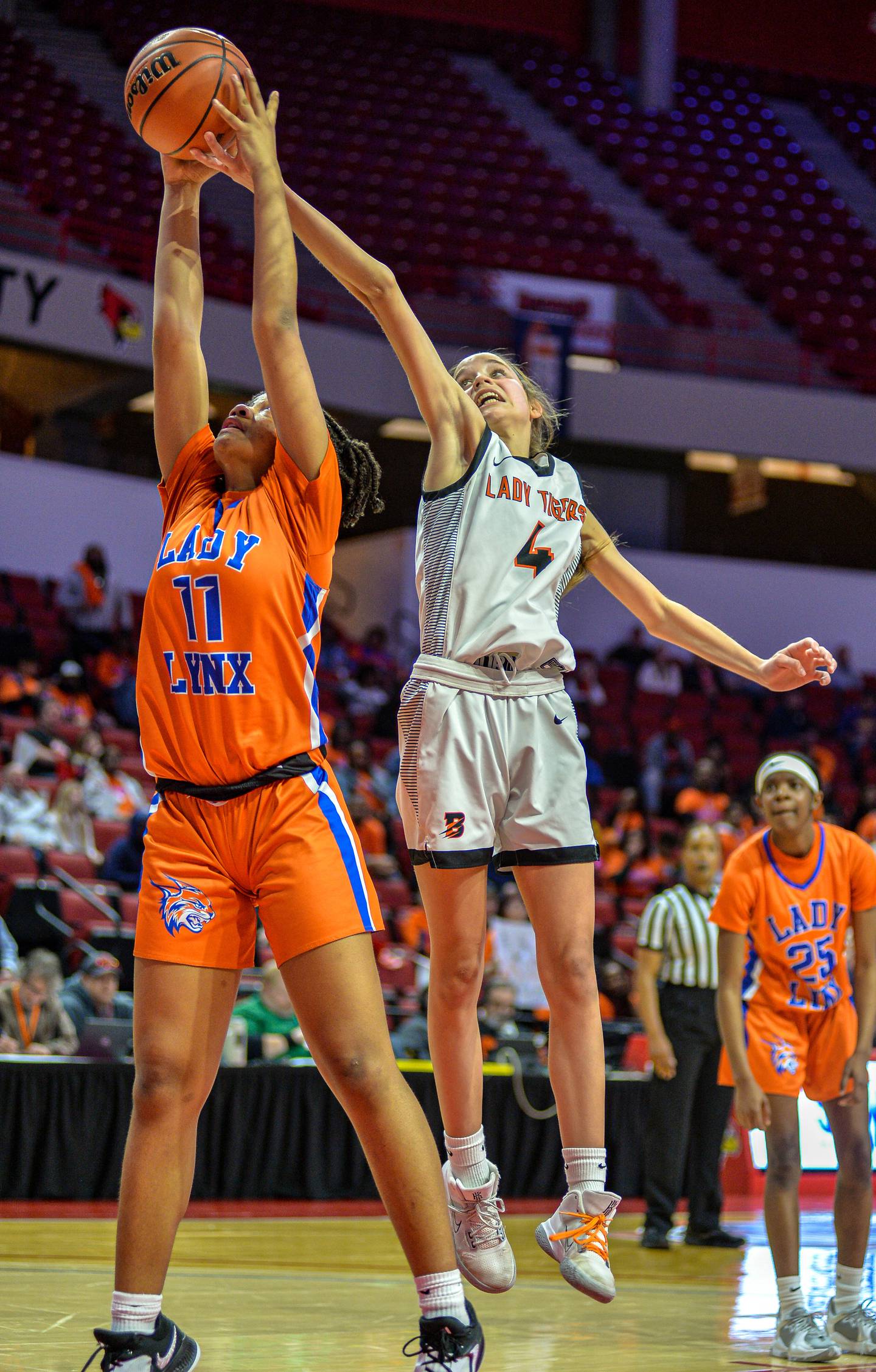 Byron's Macy Groharing (4) blocks a shot by Chicago Butler's Xyanna Walton (11) at the 2A state semifinal game March 2.