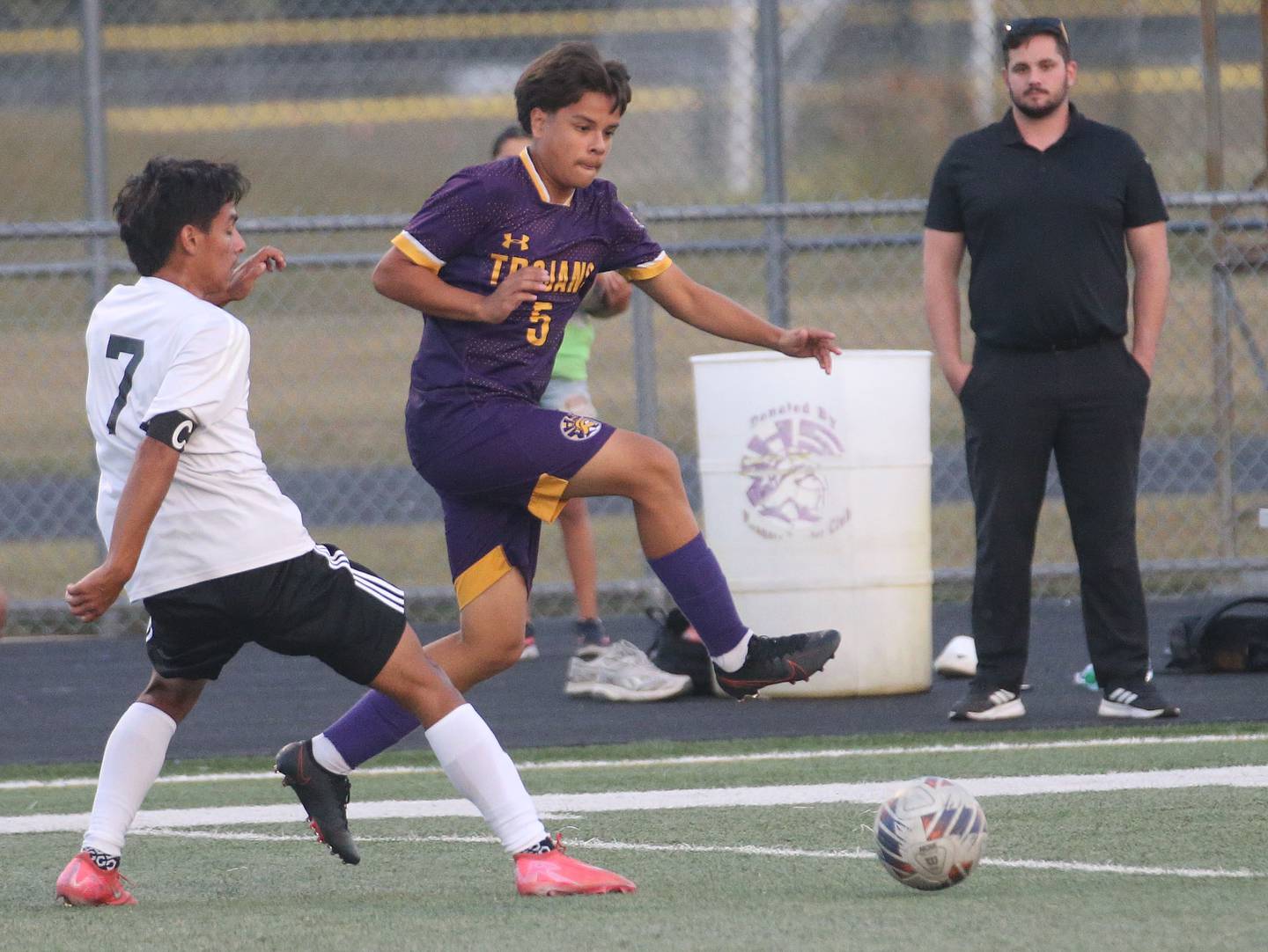 Mendota's Mauricio Salinas kicks the ball away from Kewanee's Michael Bermudez during the Three Rivers Tournament on Thursday, Oct. 2, 2025 at Mendota High School.