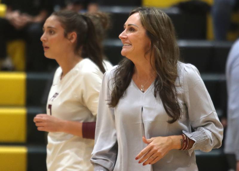 Prairie Ridge’s Head Coach Hilary Agnello and her daughter Maizy prepare to face Woodstock North in IHSA Class 3A Sectional semifinal volleyball action on Tuesday, Nov. 5, 2024, at  Crystal Lake South High School  in Crystal Lake.