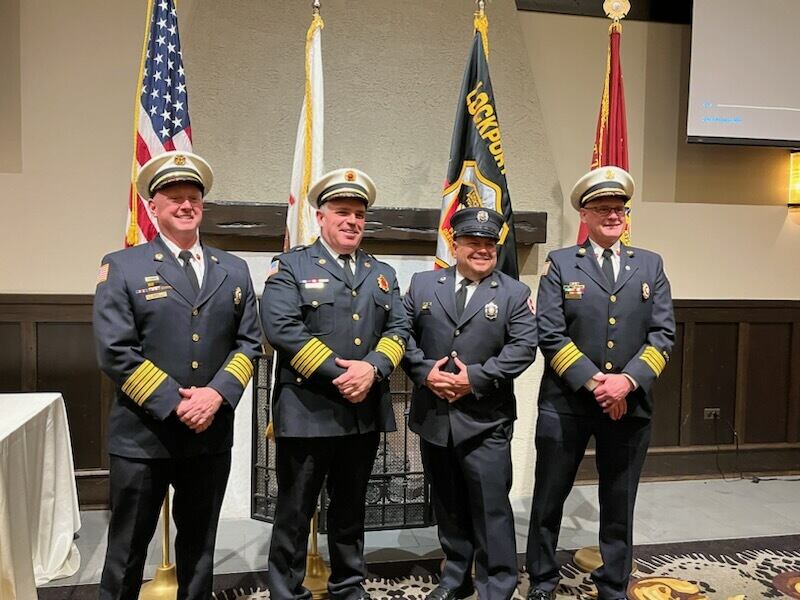 Joliet Fire Chief Jeff Carey, Lockport Fire Chief John O'Connor, Joliet Firefighter/Paramedic Dominic Minnito, and Joliet Deputy Fire Chief John Stachelski at the Lockport Fire District Awards Banquet on April 12.