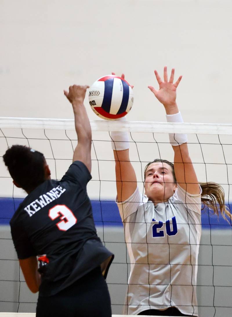 Princeton's Ellie Harp Kewanee's blocks Kewanee's Tejhiana Amos at Prouty Gym Tuesday. The Tigresses won 25-8, 25-22.