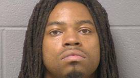 Joliet police: Officers find cocaine, heroin and guns at residence