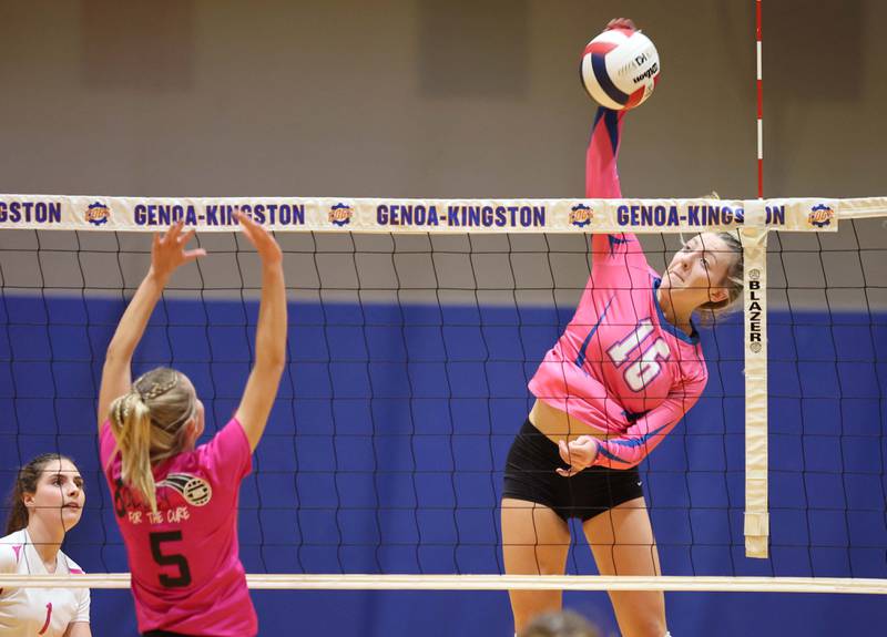Genoa-Kingston's Alayna Pierce spikes the ball during their Volley for the Cure match against Oregon Wednesday, Sept. 21, 2022, at Genoa-Kingston High School.