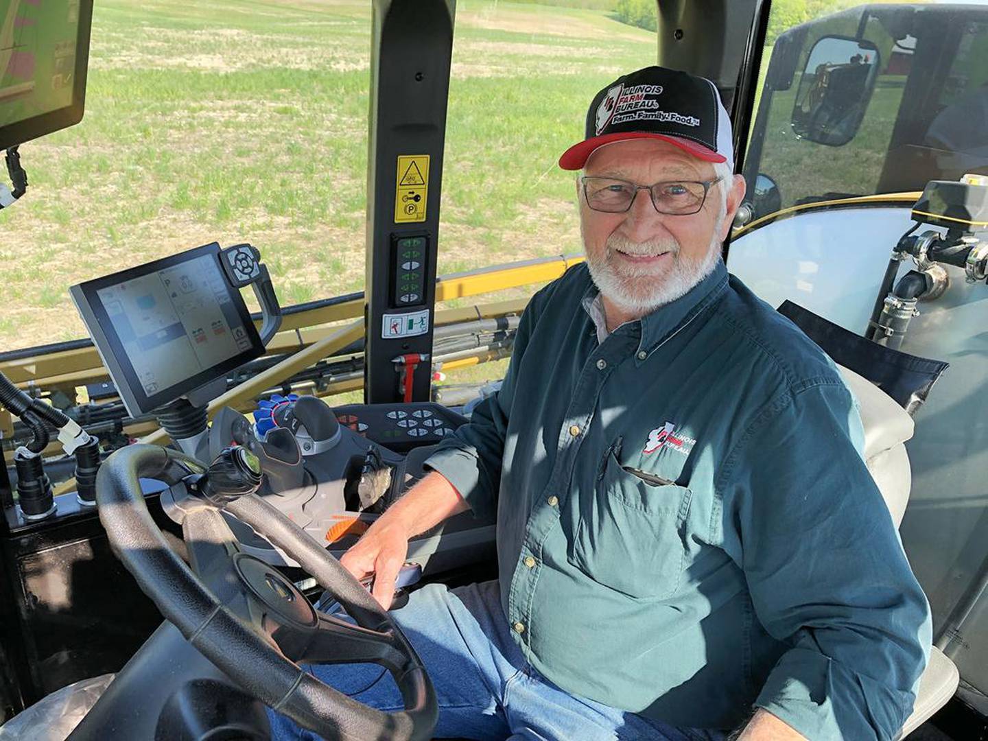 Illinois Farm Bureau President Richard Guebert Jr. applies burndown herbicides on his farm near Ellis Grove on a sunny but cool April afternoon. This is his 48th crop, last as IFB president. (Photo by Daniel Grant)