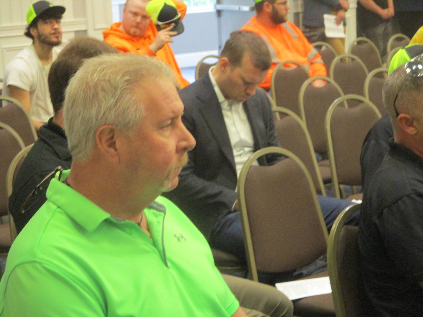 Ray Sundine of Wilmington Township listens to public comment on proposed solar farms Thursday at the Will County Board meeting in Joliet. April 16, 2026