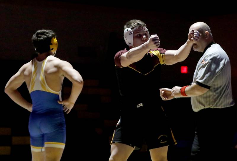 Richmond-Burton’s Blake Livdahl celebrates his win over  Johnsburg’s Duke Mays in the 150-pound match of a Kishwaukee River Conference wrestling meet on Thursday, Jan. 30, 2025, at Johnsburg High School.