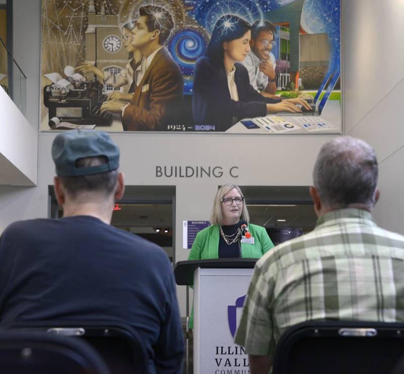 Illinois Valley Community College President Tracy Morris addresses the crowd gathered Tuesday, June 25, 2024, for the dedication of the new mural celebrating 100 years of the college.