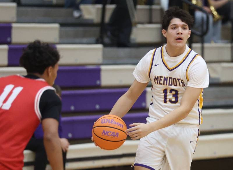 Mendota's Oliver Munoz looks to pass the ball around Ottawa's Hezekiah Joachim on Tuesday, Jan. 6, 2026 at Mendota High School.