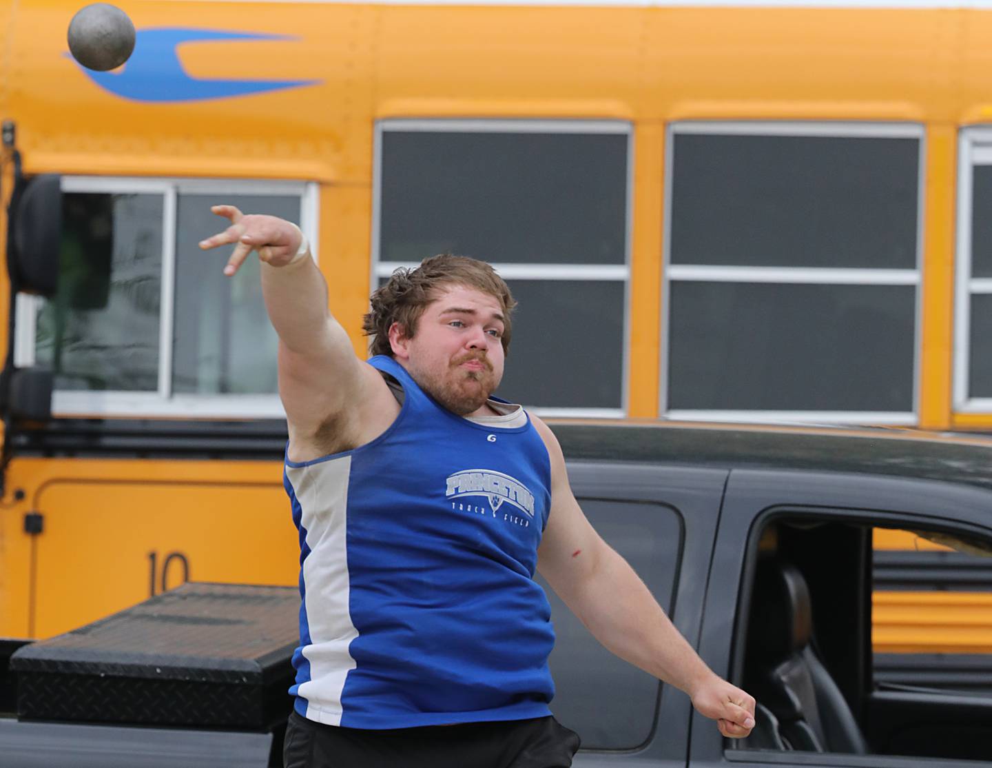 Princeton's Payne Milller throws the shot put in Friday's TRAC Meet at Princeton.