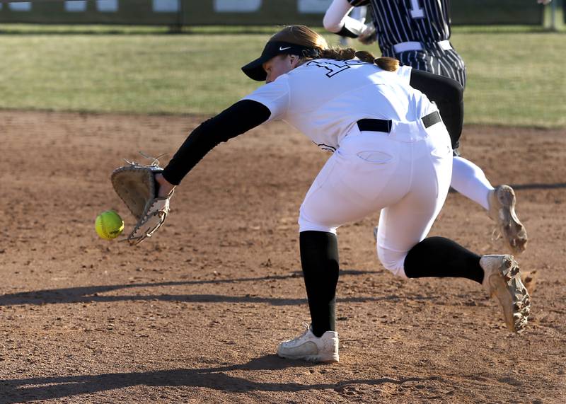 Huntley's Isabella Boskey fields a hard hit ball during Fox Valley Conference softball game against Crystal Lake Central on Tuesday, April 8, 2025, at Huntley High School.