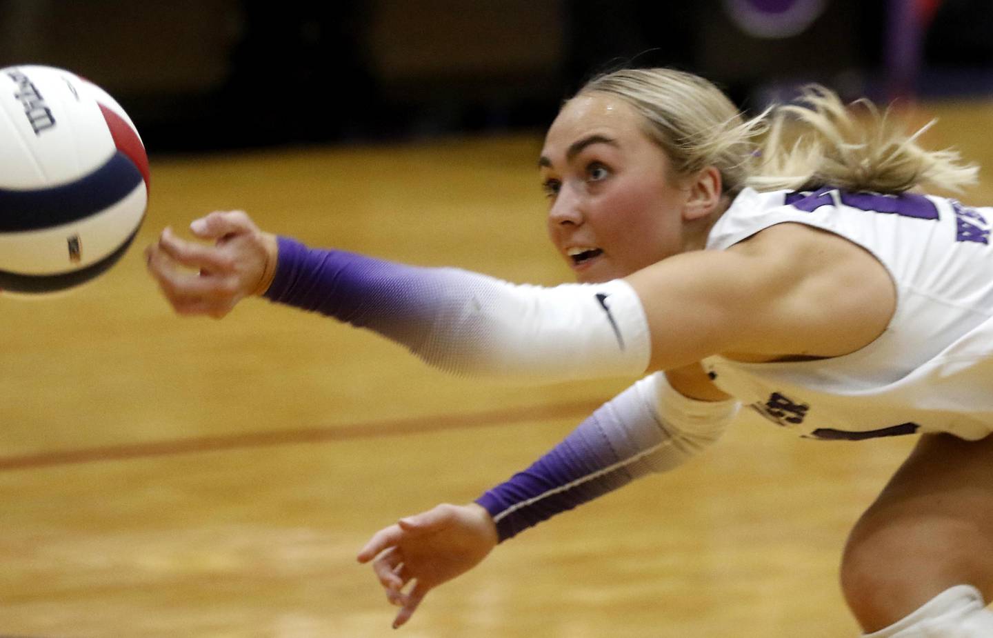 Hampshire's Katelynn Petterson tries to hit the ball before it goes out of bounds during an IHSA Class 4A Hampshire Sectional semifinal volleyball match against Mundelein on Tuesday, Nov. 4, 2025, at Hampshire High School.