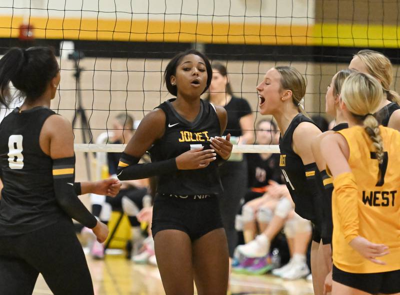 Joliet West's Mady Gant (5) and teammates react after scoring a point during Joliet West Class 4A Regional Championship game against Romeoville on Thursday, Oct 31, 2024 at Joliet. (Dean Reid for Shaw Local News)