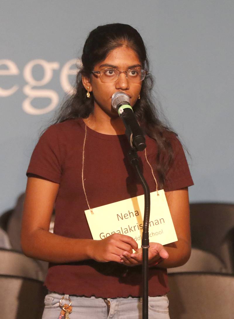 Neha Gopalakrishnan, who finished second, spells a word in the final rounds of the McHenry County Regional Office of Education's 2023 spelling bee Wednesday, March 22, 2023, at McHenry County College's Luecht Auditorium in Crystal Lake.