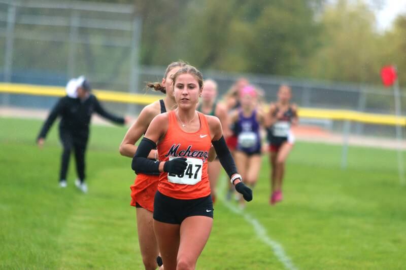 McHenry’s Danielle Jensen is ahead early on in the Fox Valley Conference Girls Cross Country Meet at Plato Park in Elgin Saturday.