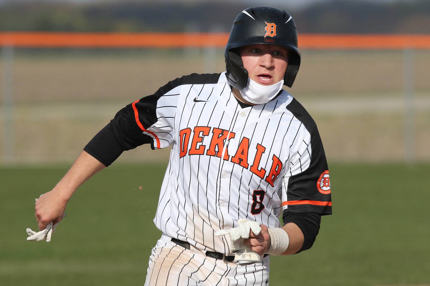 DeKalb junior Jack Keck hustles into third base during their game Thursday afternoon against Metea Valley at DeKalb High School.