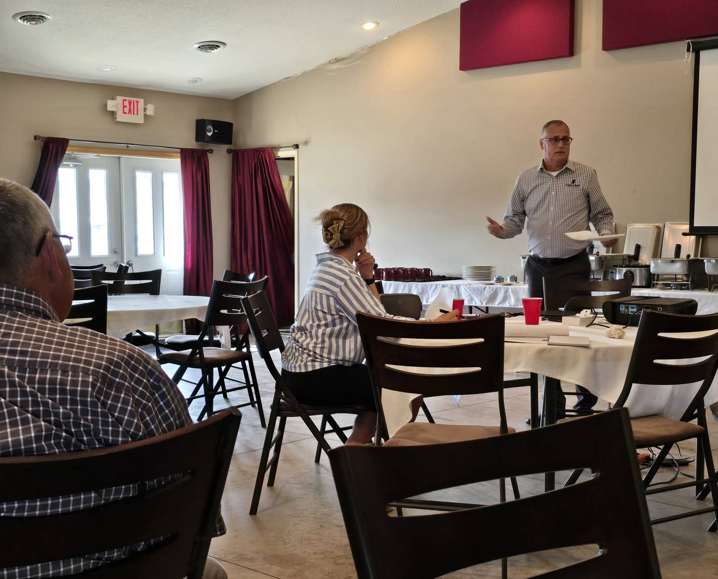 Rick Clary, Community Bank President, Princeton, talks Wednesday, Oct. 30, 2024,  among city officials and business leaders about setting up the Princeton Foundation.