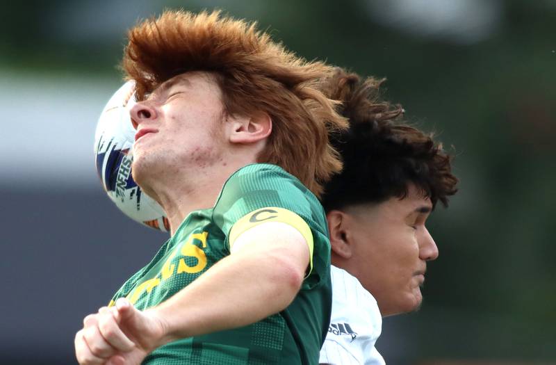 Crystal Lake South’s Pierce Johnson, front, battles Palatine’s Gavi Carmona in varsity boys soccer at Ray Porten Field on the campus of Wauconda High School in Wauconda on Wednesday, Sept. 3, 2025.