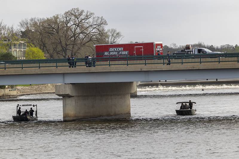 Search squads check the Rock River in Dixon Tuesday, April 14, 2026, after an individual jumped over the railing off of the Peoria Avenue Bridge late Monday night.