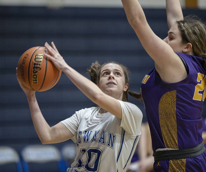 Newman’s Helen Papoccia puts up a shot against Mendota’s Reanna Brant Monday, Dec, 12, 2022.