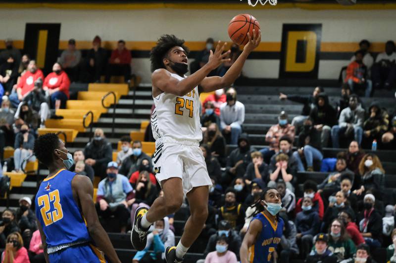 Joliet West's Jayden Martin lays in a shot against Joliet Central. Saturday, Dec. 11, 2021 in Joliet.