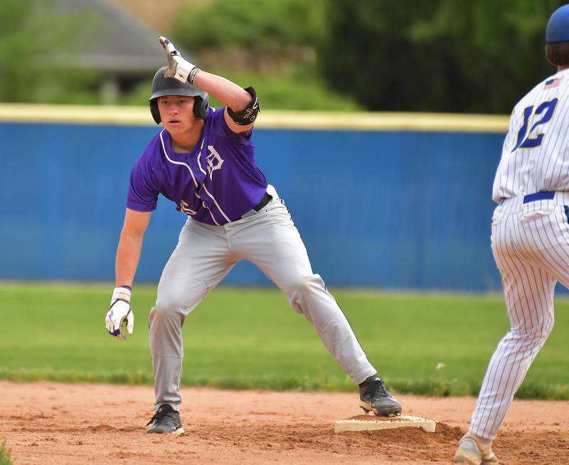 Downers Grove North’s Rhys Dominow signals to the dugout after hitting a double during a game against Lyons Township on May 18, 2026 at Lyons Township High School in LaGrange.