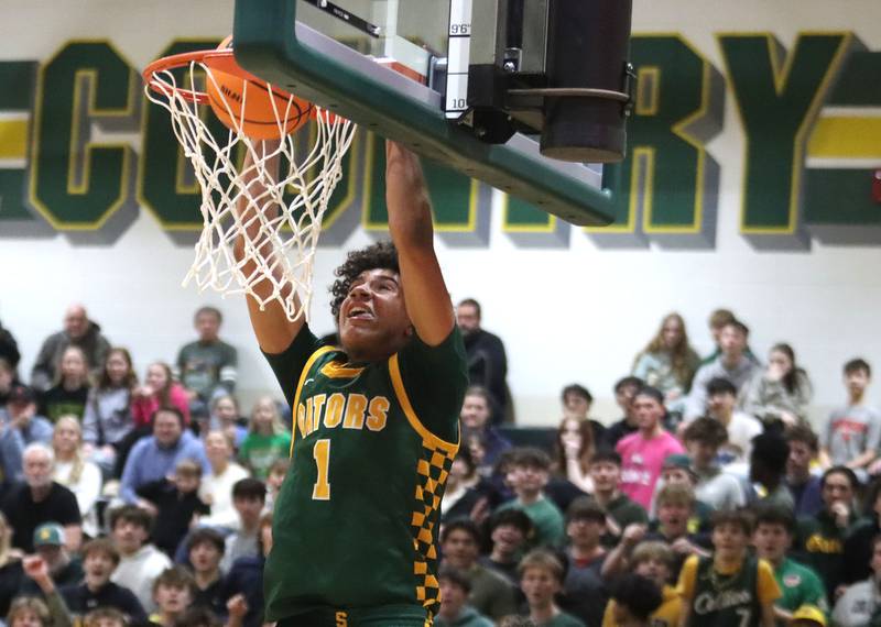 Crystal Lake South’s Noah Cook slams the ball for a fourth-quarter dunk against Cary-Grove in boys IHSA Class 3A Regional Championship basketball on Friday, Feb. 27, 2026, at Crystal Lake South High School in Crystal Lake.